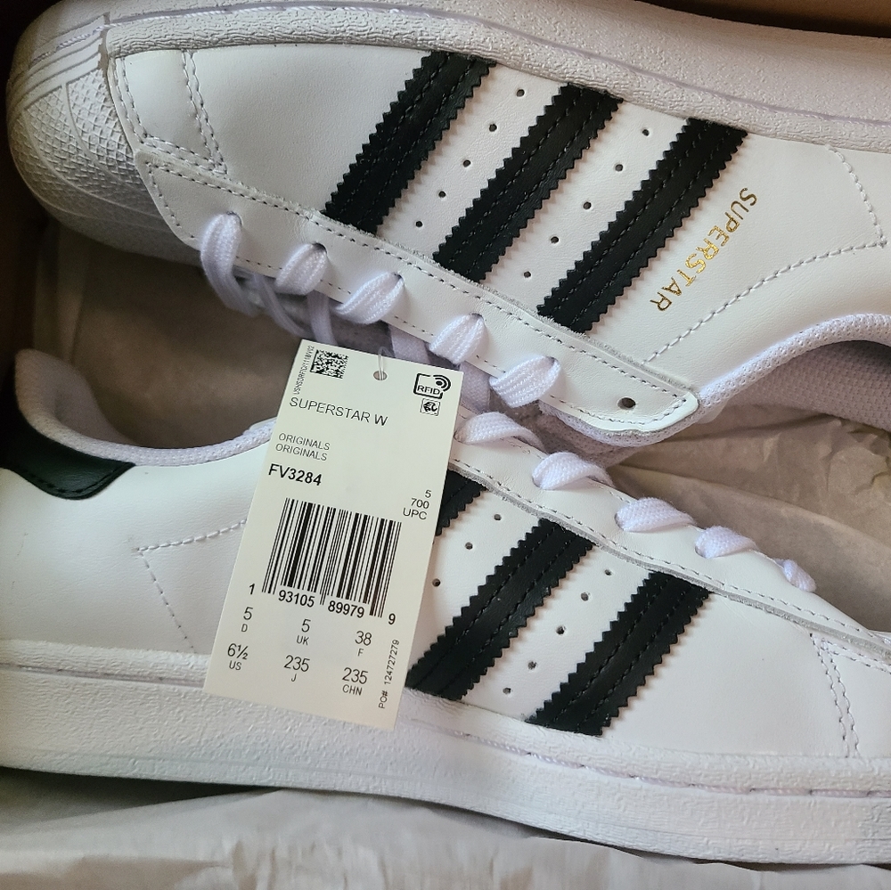 Never worn superstar Adidas
